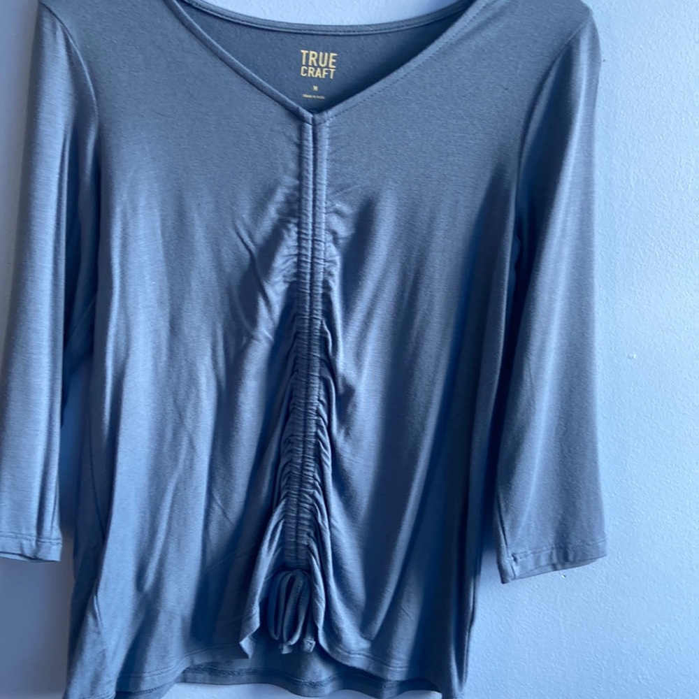 A blue long sleeve shirt